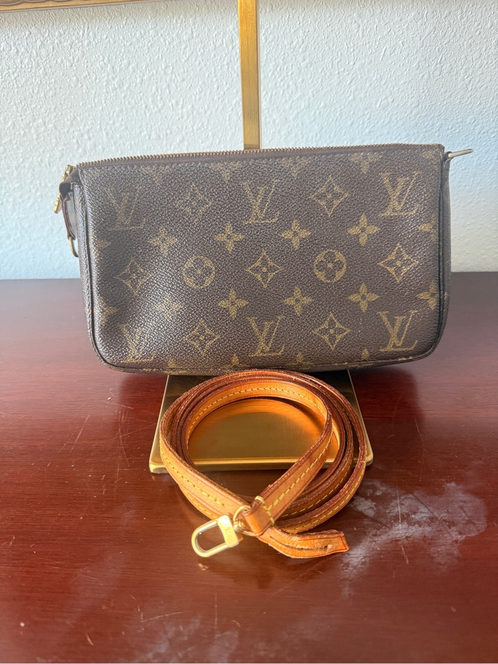 Authentic Louis Vuitton Monogram Pochette with Tan Leather Crossbody Strap